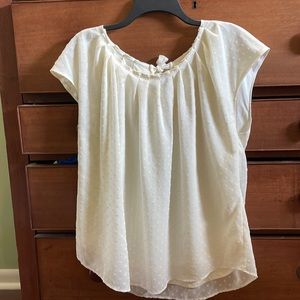 Lauren Conrad sleeveless top. Cream colored sheer outer shell with mini hearts.